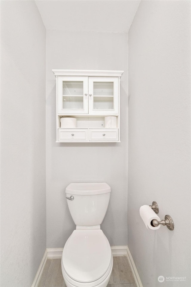 bathroom featuring toilet