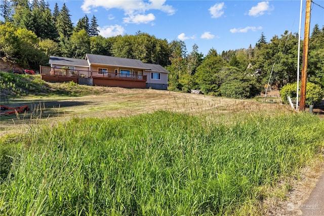 view of yard with a deck