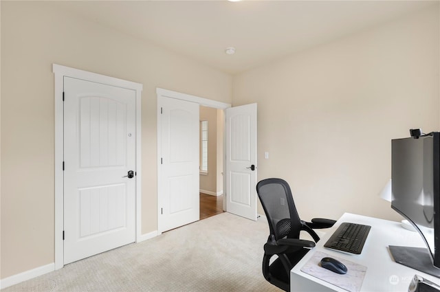 office space with light colored carpet