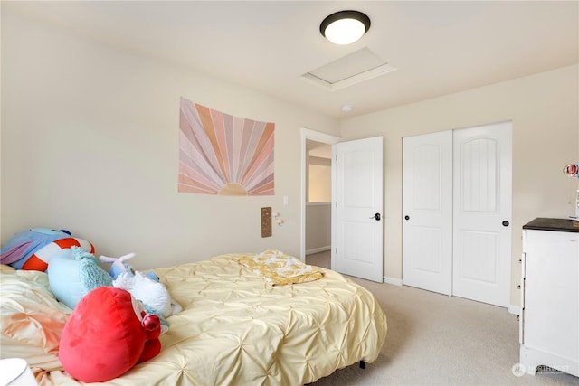 carpeted bedroom featuring a closet