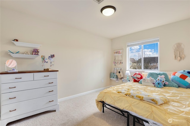 bedroom featuring light colored carpet