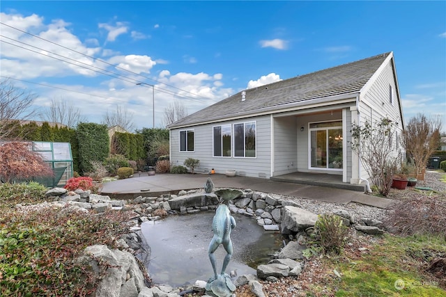 rear view of house with a patio area