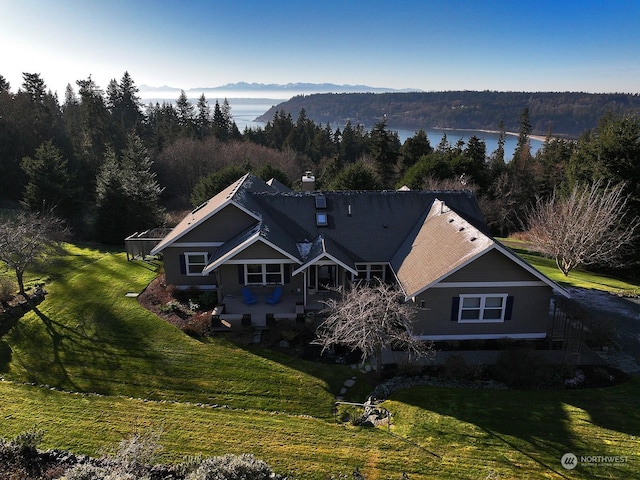 bird's eye view featuring a water and mountain view