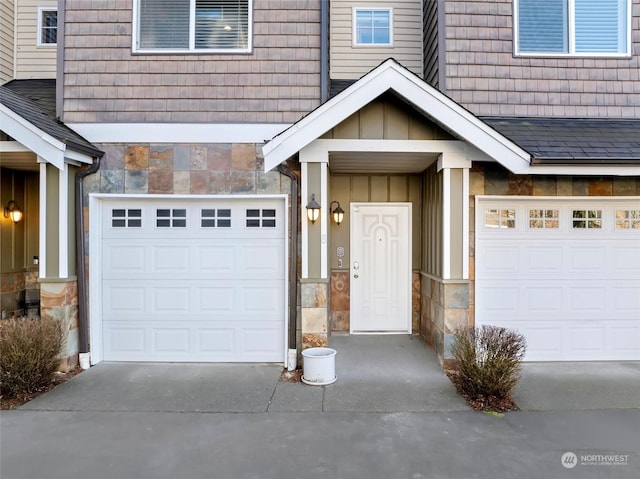 property entrance with a garage