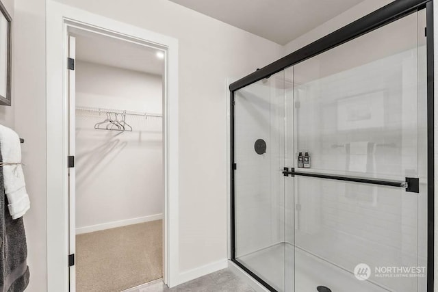 bathroom featuring an enclosed shower