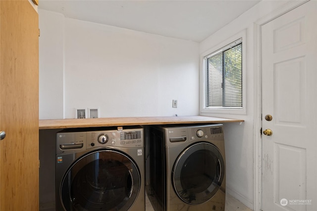 laundry area featuring independent washer and dryer