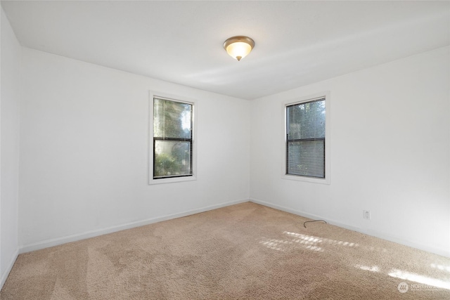 view of carpeted spare room