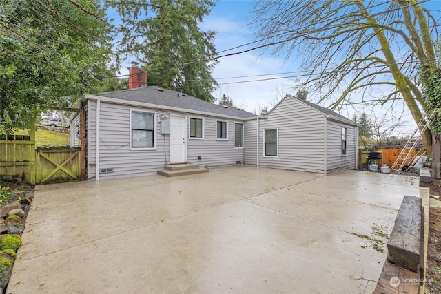 rear view of house with a patio