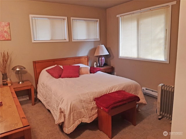 carpeted bedroom featuring radiator and baseboard heating