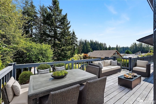 wooden deck featuring an outdoor living space