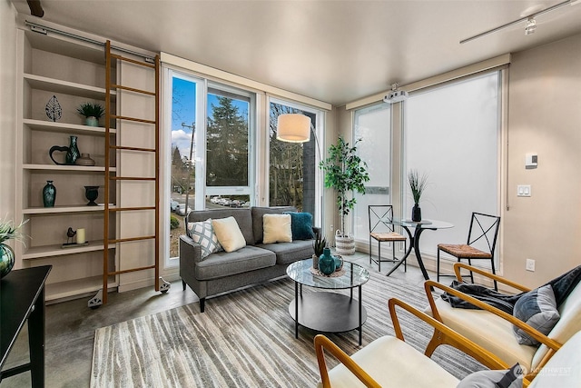 sunroom / solarium with track lighting