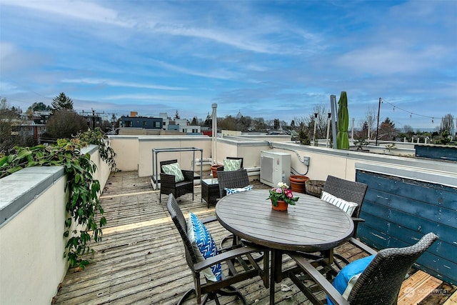 wooden balcony featuring a deck