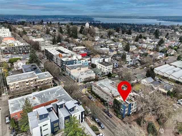 birds eye view of property featuring a water view