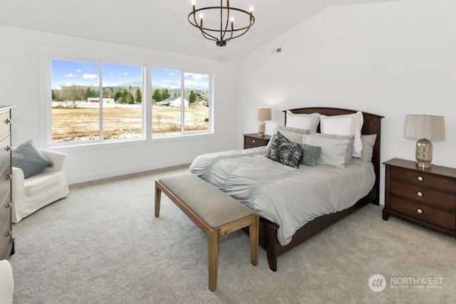 bedroom featuring lofted ceiling, light colored carpet, and a chandelier