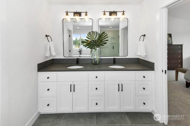 bathroom featuring vanity and tile patterned flooring