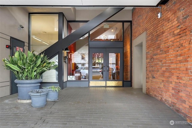 view of exterior entry featuring french doors