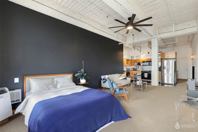 bedroom featuring stainless steel refrigerator with ice dispenser, a wall mounted AC, carpet floors, beamed ceiling, and a high ceiling