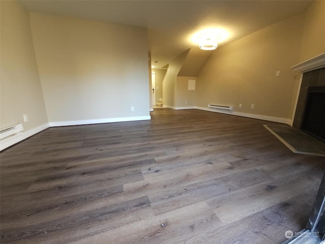 unfurnished living room with a tiled fireplace, a baseboard radiator, and dark hardwood / wood-style floors