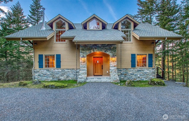 view of front of home with stone siding