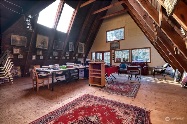 office area featuring hardwood / wood-style flooring and high vaulted ceiling