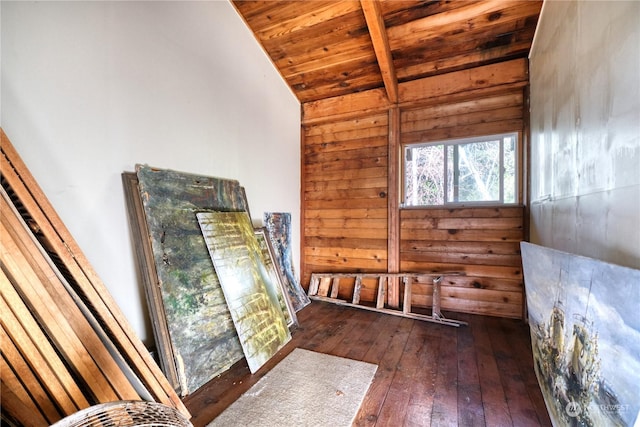 interior space featuring high vaulted ceiling, beam ceiling, wooden ceiling, and dark hardwood / wood-style floors