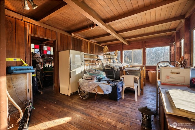 sunroom with beamed ceiling and wooden ceiling