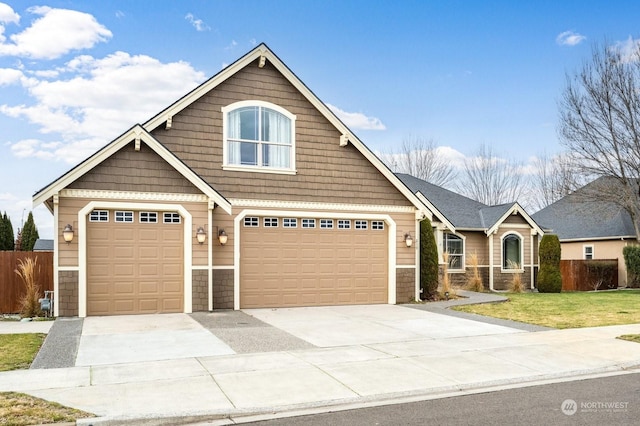 craftsman inspired home with a garage