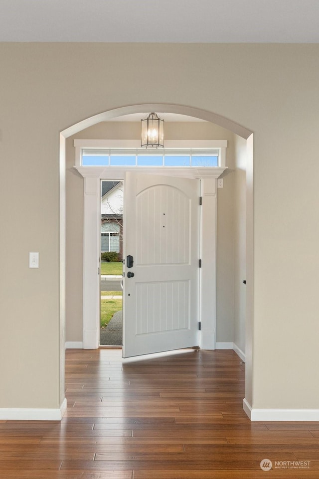 foyer with dark wood-type flooring