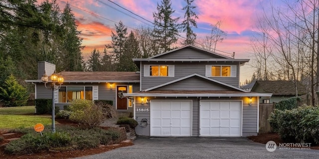 view of front of property featuring a garage