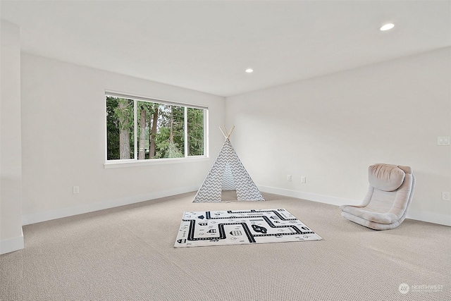 game room with recessed lighting, carpet flooring, and baseboards