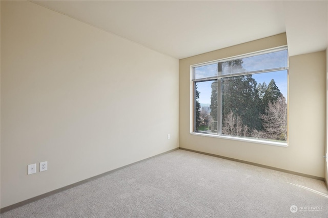 view of carpeted spare room