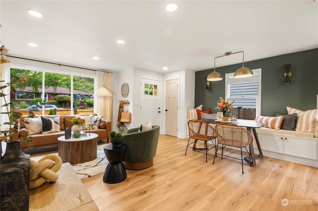 living room with light hardwood / wood-style floors