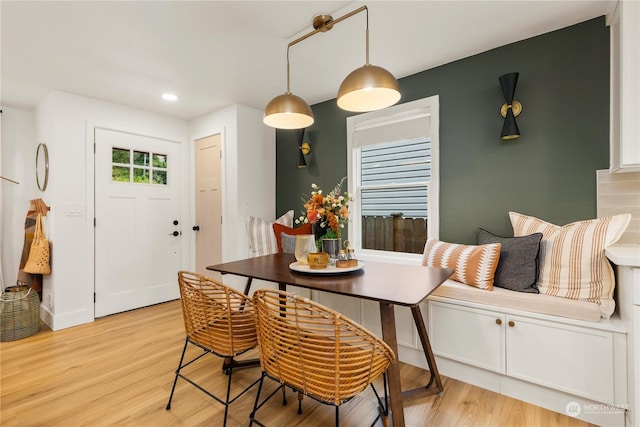 dining area with light hardwood / wood-style flooring