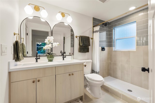 bathroom featuring vanity, toilet, and walk in shower