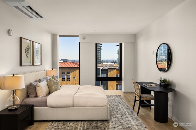 bedroom featuring light hardwood / wood-style flooring