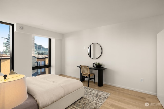 bedroom featuring light hardwood / wood-style floors