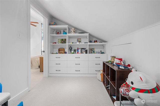 recreation room with lofted ceiling and light colored carpet