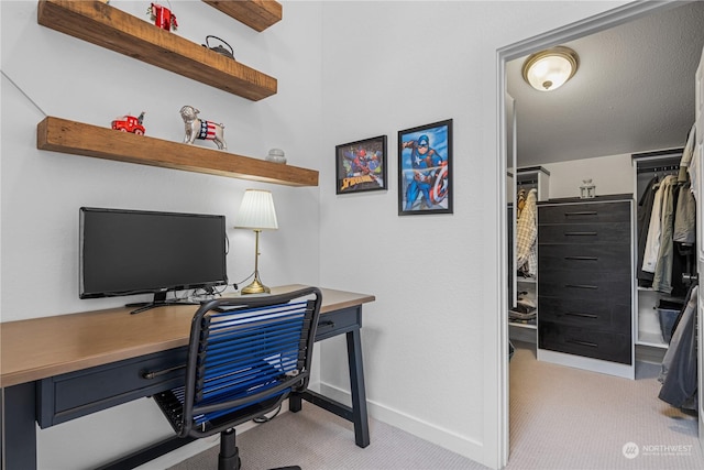 office area with light colored carpet