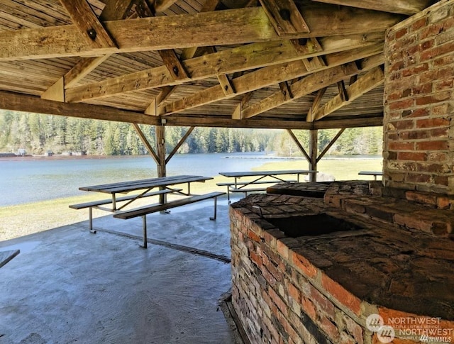 view of patio / terrace with a water view