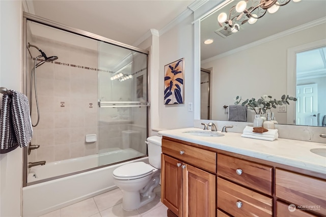 full bathroom featuring enclosed tub / shower combo, tile patterned flooring, vanity, ornamental molding, and toilet