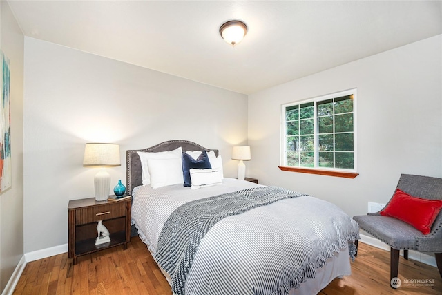 bedroom featuring hardwood / wood-style flooring