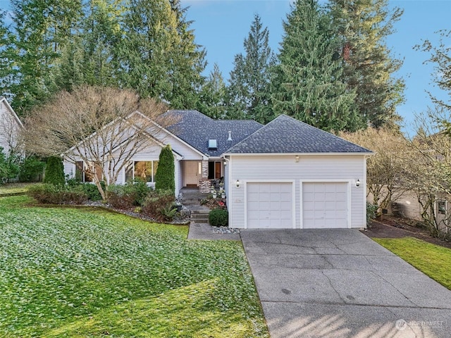 ranch-style house featuring a garage and a front lawn