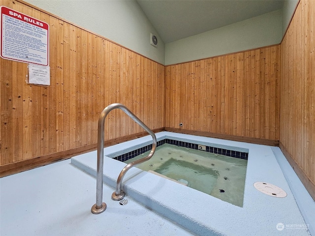 view of pool with an indoor in ground hot tub