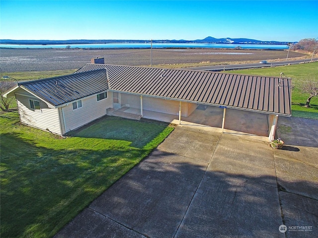 aerial view with a water and mountain view