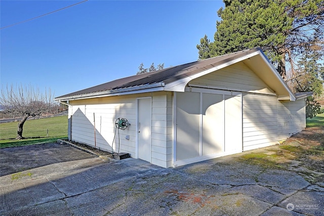 view of outdoor structure with a garage