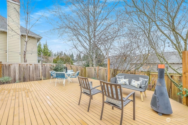 deck featuring outdoor lounge area