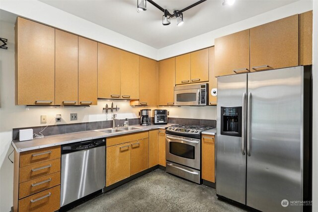 kitchen featuring sink and appliances with stainless steel finishes