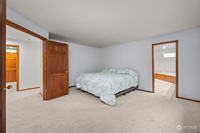 bedroom featuring light colored carpet