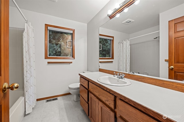 full bathroom featuring vanity, toilet, and shower / bath combo with shower curtain