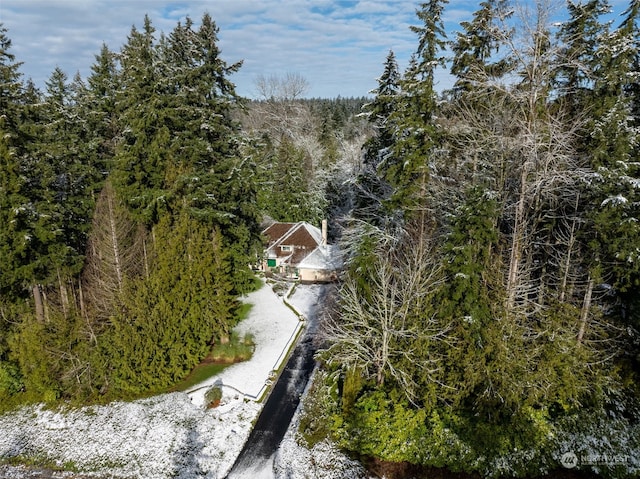 aerial view featuring a view of trees